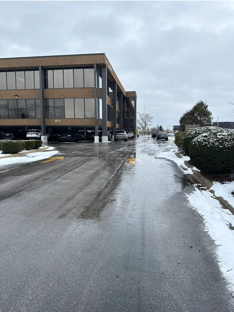 Drive lane and parking areas at the Oak Brook commercial snow-service property